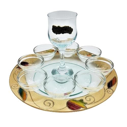 סט מהודר לערב ראש השנה. צלחת ראש השנה יוקרתית מזכוכית עם עיטורי רימונים בעבודת יד עם בומצים + גביע קידוש מהודר. מחיר מבצע אתר מתנות ישראל