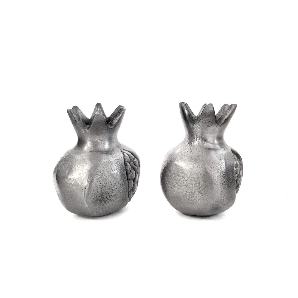 A pair of elegant candlesticks (13.5 * 11 cm) made of hand-hammered aluminum and decorated with rings with a colorful finish - designed and produced by artist Yair Emmanuel