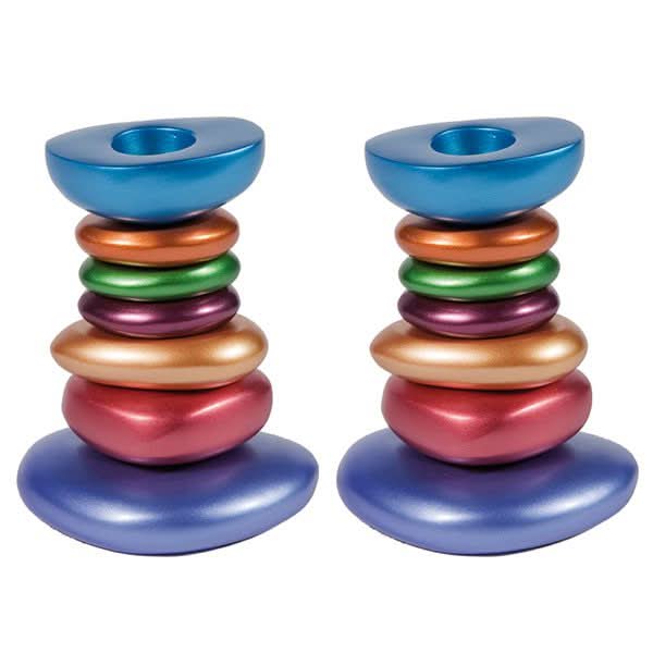 A pair of elegant "river pebble" candlesticks (8.5 * 5 * 11.5 cm) made of colored aluminum - designed and produced by artist Yair Emanuel. Home delivery