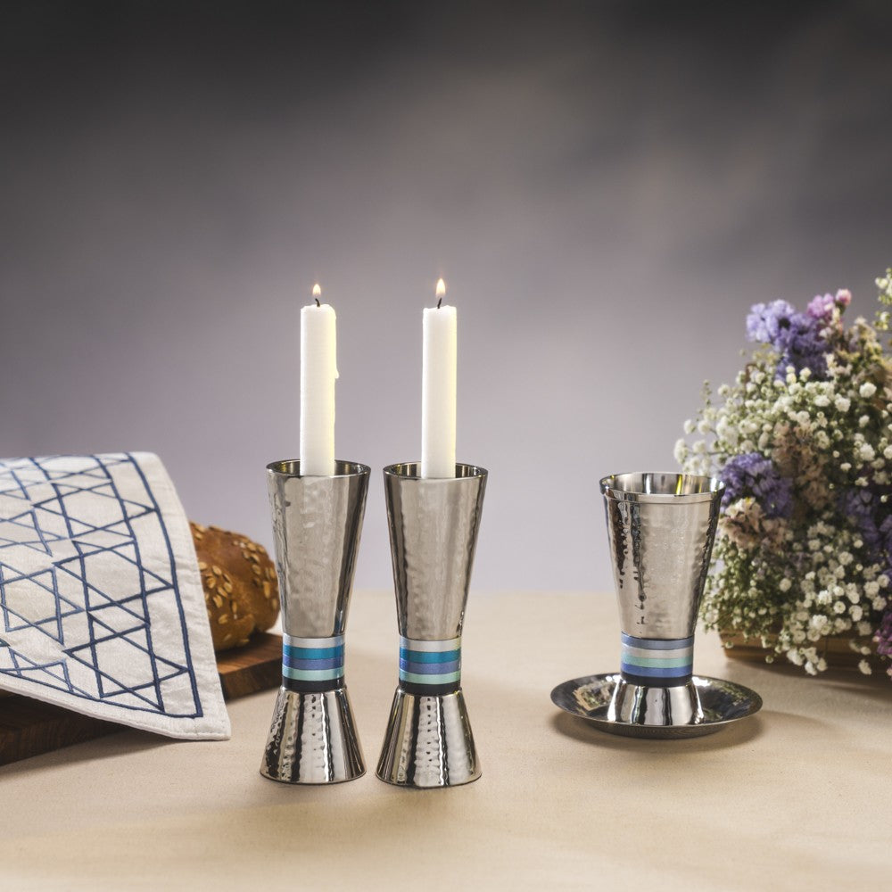 A pair of elegant candlesticks (13.5 * 11 cm) made of hand-hammered aluminum and decorated with rings with a colorful finish - designed and produced by artist Yair Emmanuel