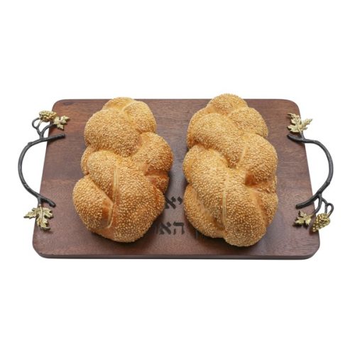 A large metal challah board made of dozens of colorful pomegranates, precisely laser-cut and hand-painted. Designed by artist Yair Emanuel