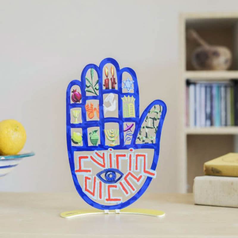 סטנד "חמסה" (22*16 ס"מ) "בשורות טובות" עשוי ממתכת, מיוצר ע"י האמן דוד גרשטיין