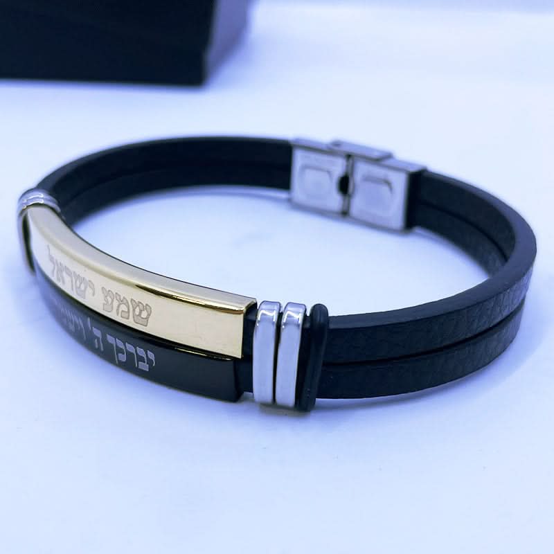 צמיד 2 ברכות:"שמע ישראל" ו-"יברכך ה וישמרך" לגבר מסטיל(פלדת אל חלד). מגיע עם רצועת עור כפולה ו2 פלטות סטיל עם הכיתובים. ציפוי PVD חזק זהב צהוב ושחור חזק. ניתן לקיצור! מחיר מבצע באתר מתנות ישראל.