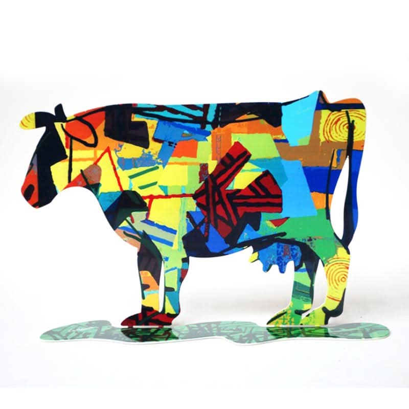 סטנד “הפרה דורה” ממתכת (38*25 ס"מ) צבעוני דו צדדי. יצירה זו היא חלק מקולקציית הפרות של האמן. עשוי מתכת בחיתוך לייזר מדויק. מעוצב ומיוצר ע”י האמן הבינלאומי דוד גרשטיין. מחיר מבצע באתר מתנות ישראל - מרכז המתנות הישראלי