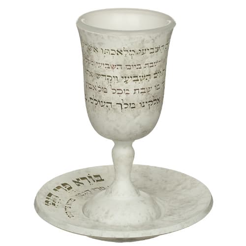 An elegant Kiddush cup (15 cm) made of stone-like polyresin "The Sixth Day..." with a bottom "The Creator of the Fruit of the Vine"