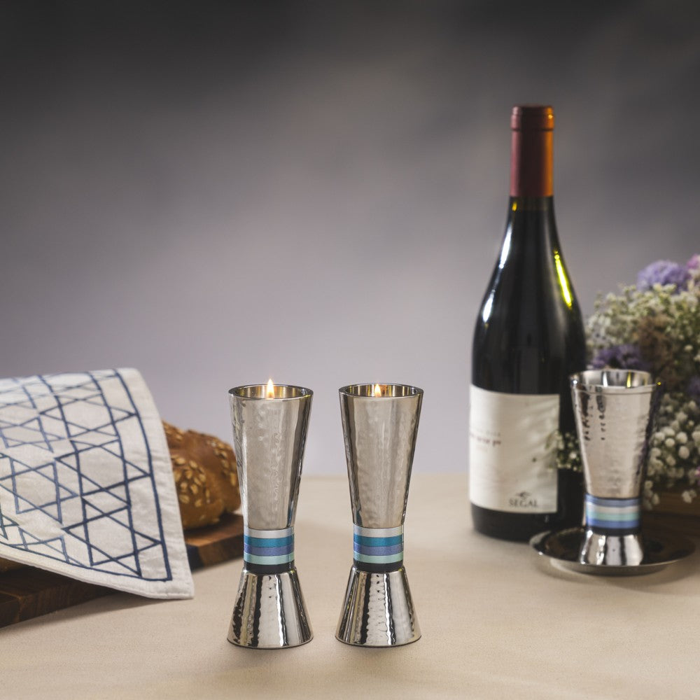 A pair of elegant candlesticks (13.5 * 11 cm) made of hand-hammered aluminum and decorated with rings with a colorful finish - designed and produced by artist Yair Emmanuel