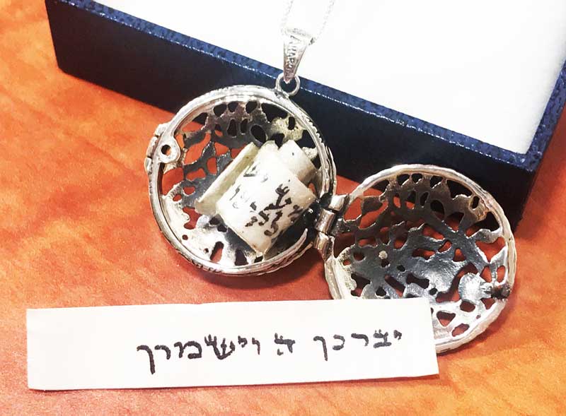 A parchment amulet for protection, protection and success written by a simple writer for mezuzah pendants made of calfskin