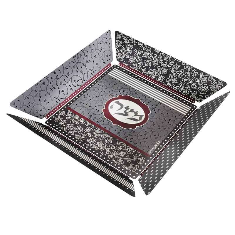 A designed matzah tray (27*27 cm) made of metal by designer Dorit Klein