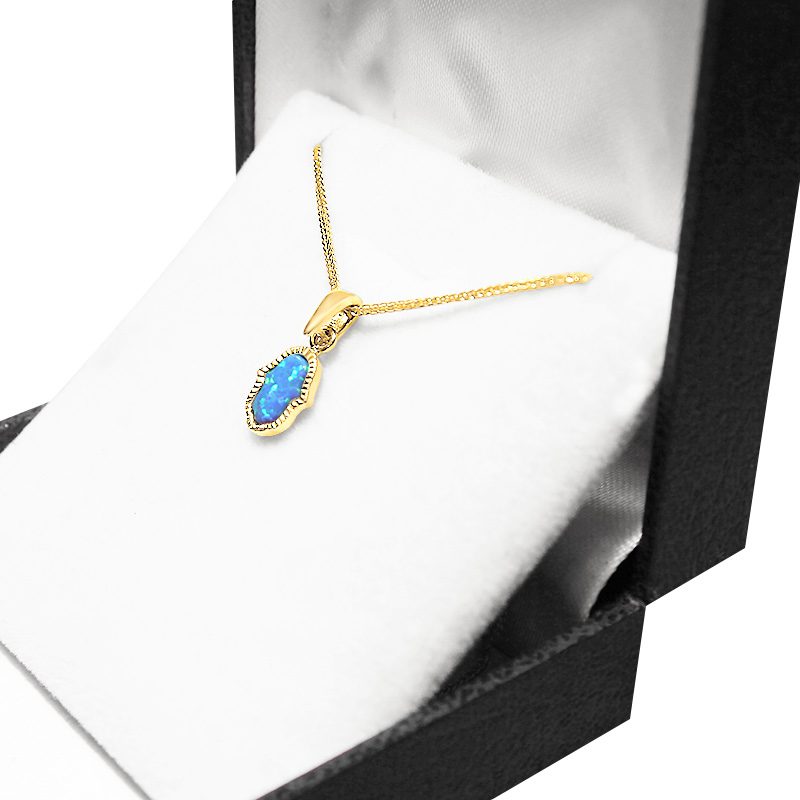 Small Hamsa pendant (1.2*0.7 cm) in 14k yellow gold with opal stone