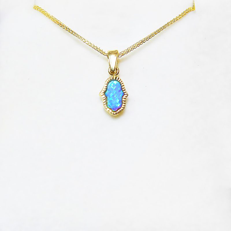 Small Hamsa pendant (1.2*0.7 cm) in 14k yellow gold with opal stone