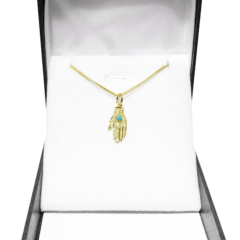 Small Hamsa pendant (1.6*0.8 cm) in 14k yellow gold set with turquoise stone