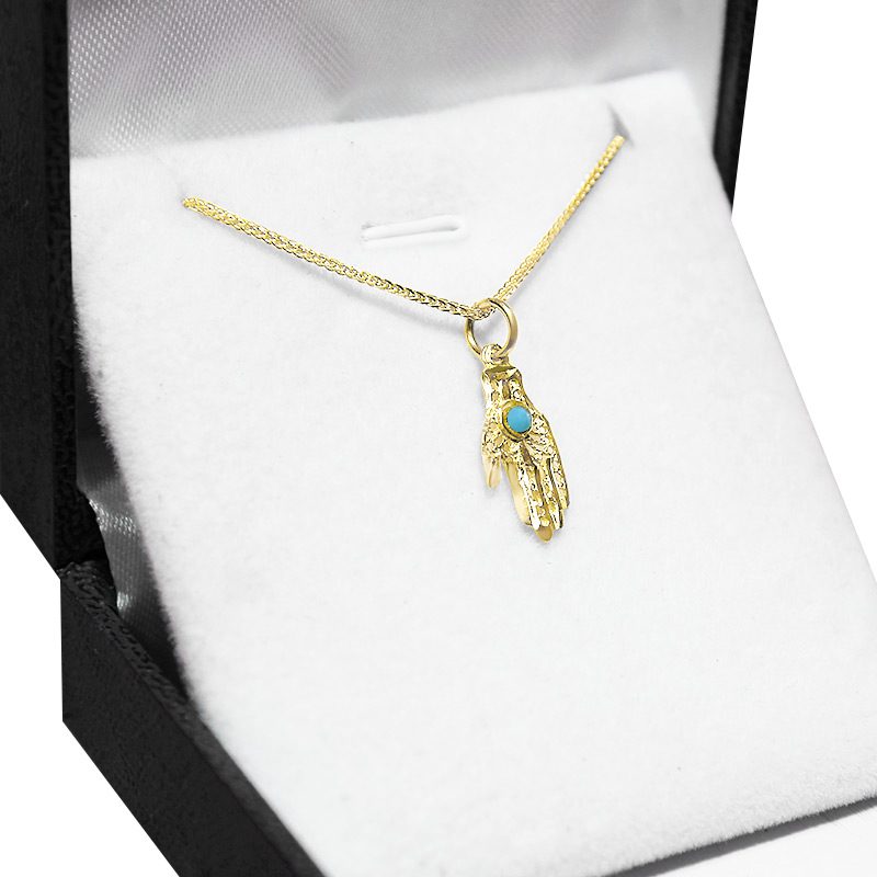 Small Hamsa pendant (1.6*0.8 cm) in 14k yellow gold set with turquoise stone