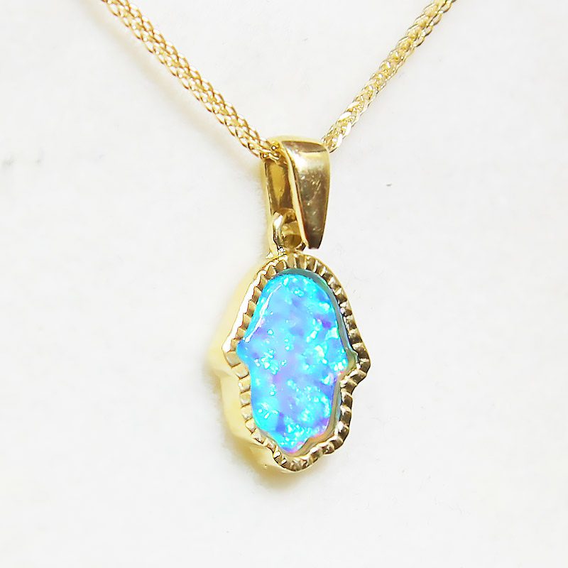 Hamsa pendant (1.25*1 cm) in 14k yellow gold with opal stone