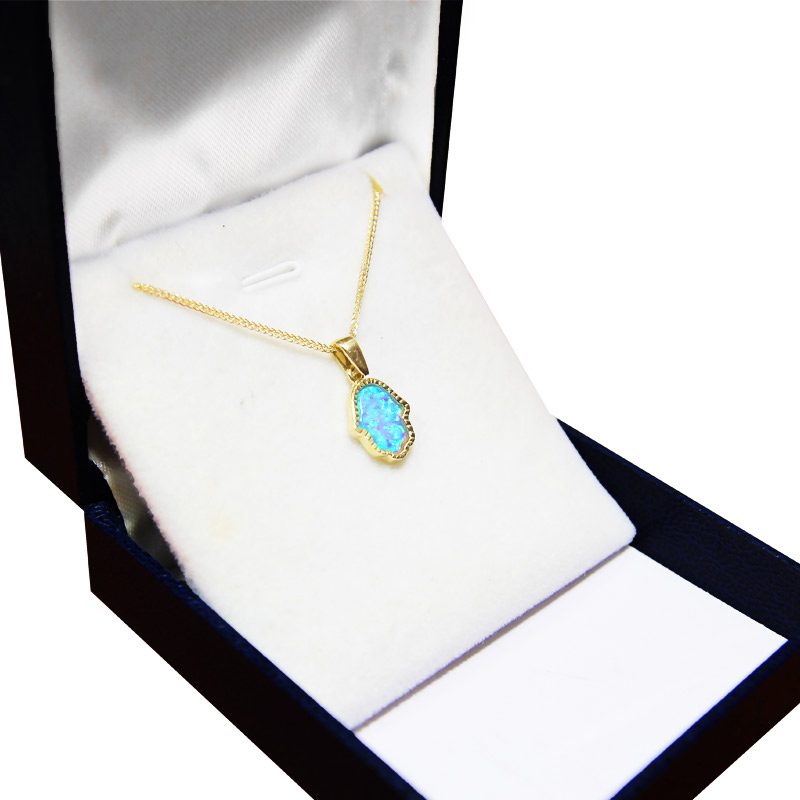 Hamsa pendant (1.25*1 cm) in 14k yellow gold with opal stone