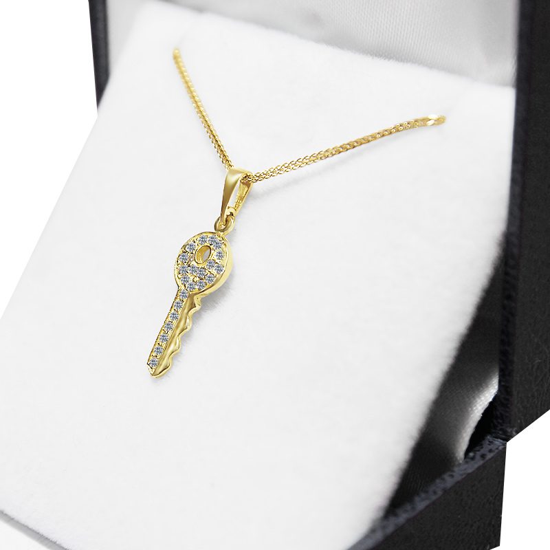 "Key" pendant (2.2*0.8 cm) in 14k yellow gold with crystals