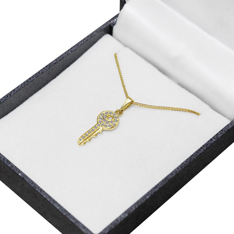 "Key" pendant (2.2*0.8 cm) in 14k yellow gold with crystals